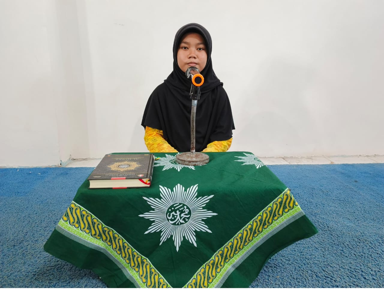 Desiana Nikita Putri, siswa SMP Muhammadiyah 8 Benjeng, sukses melaksanakan ujian Tasmik Juz 30 secara live