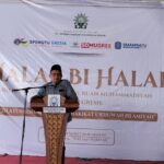 Muhammad Abduh wakil ketua pimpinan wilayah Muhammadiyah Jawa Timur saat memberikan tausiyah di acara halal bihalal perguruan Muhammadiyah kecamatan Gresik, Sabtu (28/3/2026). (Bening/girimu.com)