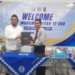 epala SMP Mulan, Amrillah M.Pd. dan Waka Kesiswaan Spemdalas, Ichwan Arif, M. Hum berfoto