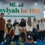 Ketua PCM GKB (kiri) dan Kerua PCA GKB (kanan) berfoto setelah santunan anak yatim